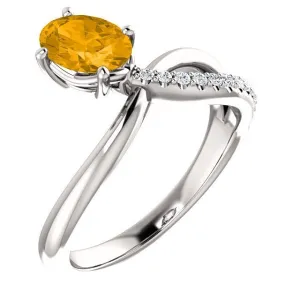 14KT GOLD 0.72 CT CITRINE & 1/10 CTW DIAMOND BYPASS RING