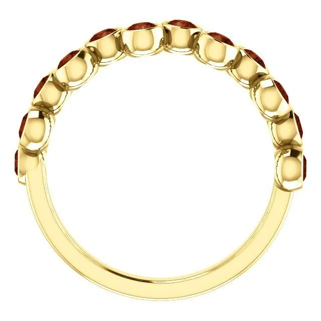 14KT GOLD 1.00 CTW ROUND GARNET BEZEL SET RING