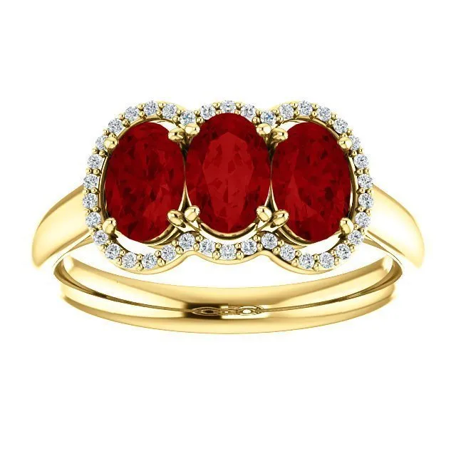 14KT GOLD 1.80 CTW RUBY & .10 CTW DIAMOND 3 STONE OVAL HALO RING