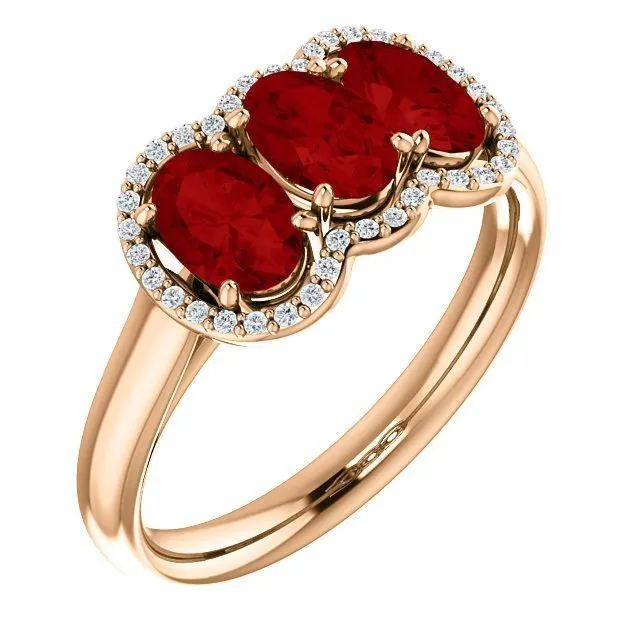 14KT GOLD 1.80 CTW RUBY & .10 CTW DIAMOND 3 STONE OVAL HALO RING