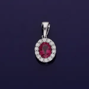 18ct White Gold Ruby and Diamond Oval Cluster Halo Pendant