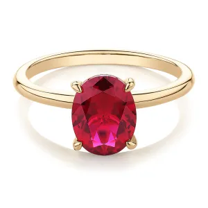 Dress ring with ruby simulant in 10 carat yellow gold