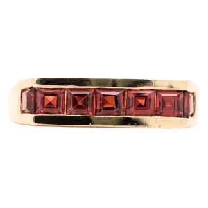 Estate: 14K Spessertine Garnet Channel Set Band