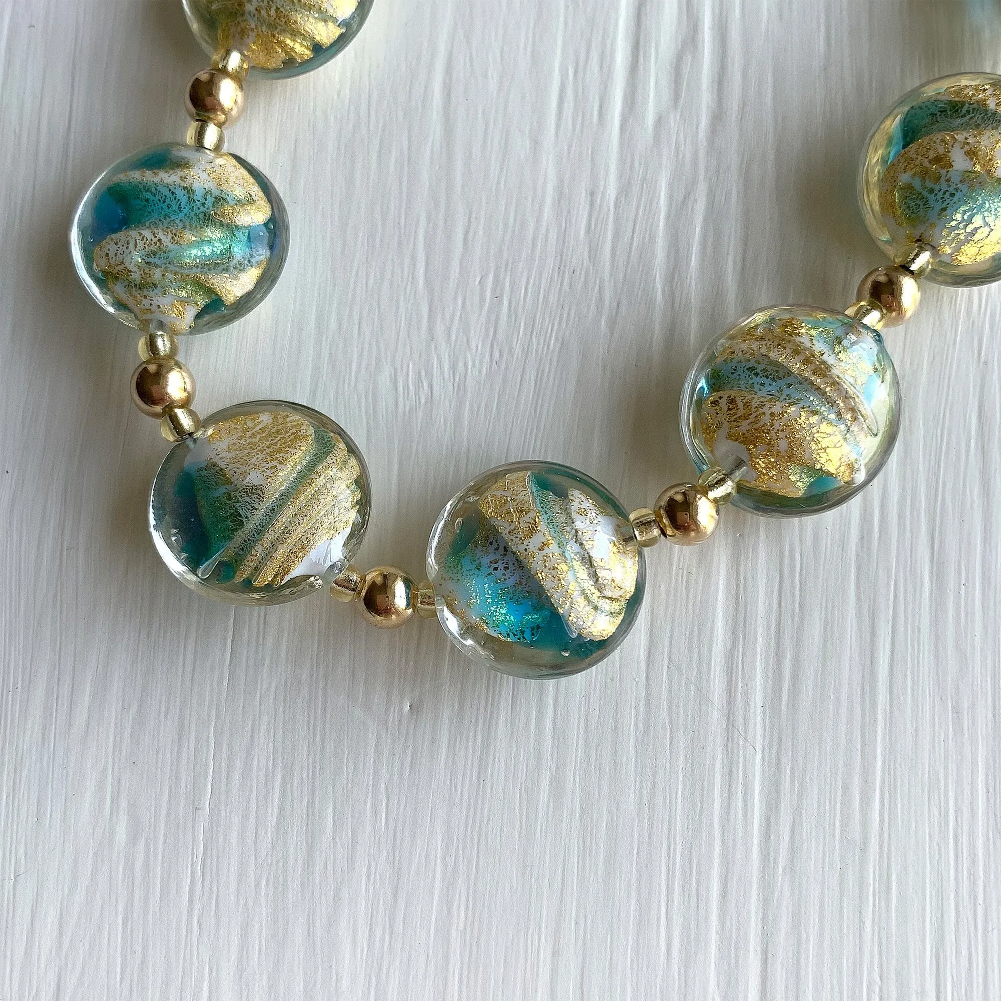 Necklace with turquoise (blue), white and gold Murano glass medium lentil beads on gold