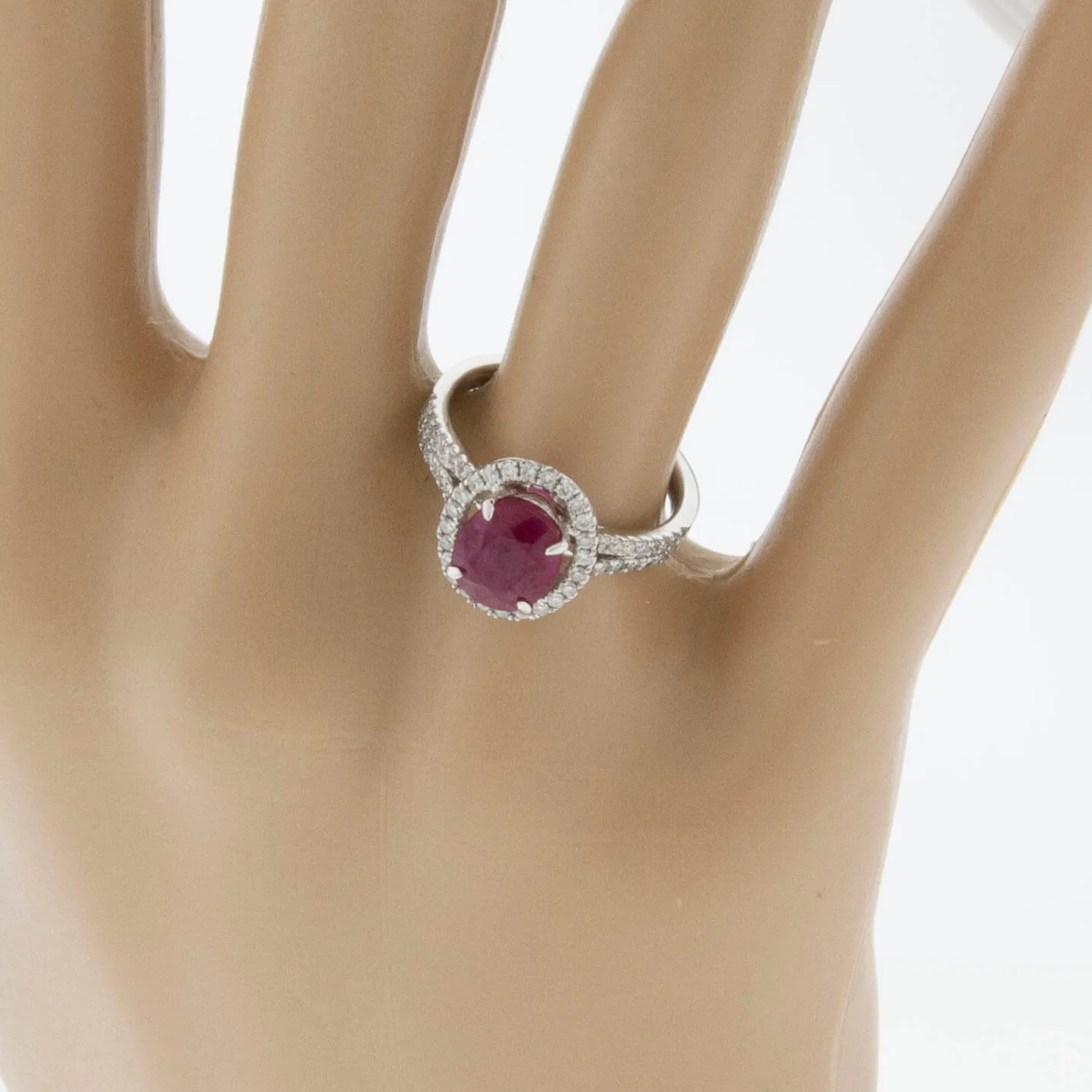 Oval Ruby and Split Shank Diamond Halo Ring